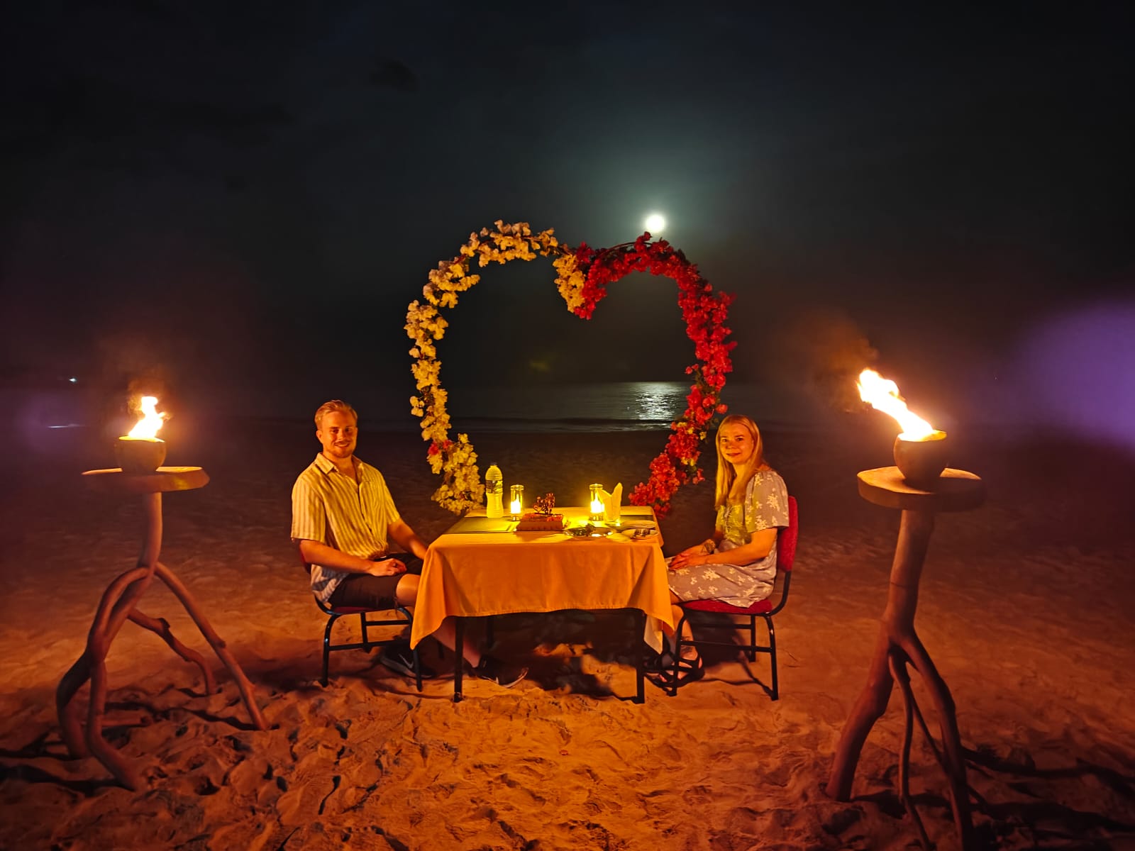 Romantic beach dinner setup